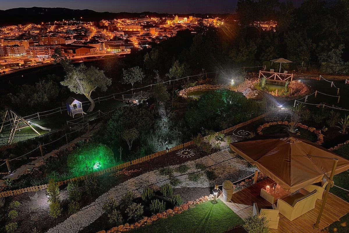 Garden at Algarve Serena at night, overlooking the town