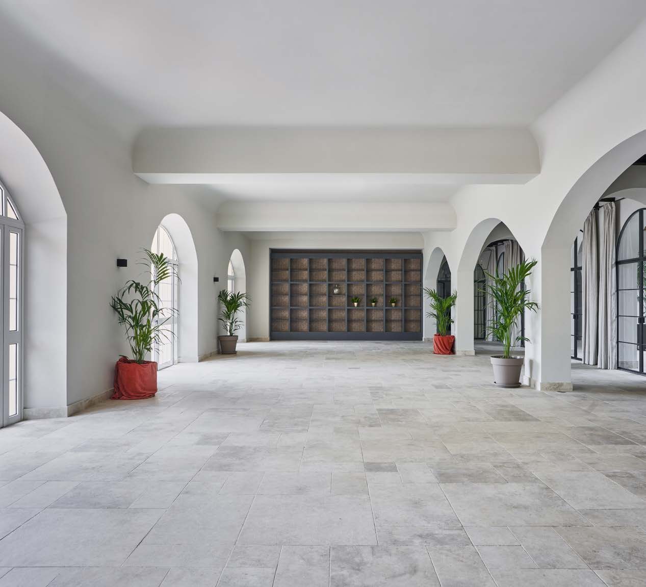 Arched stone lobby at Montecastillo, leading to the wine cellar wall