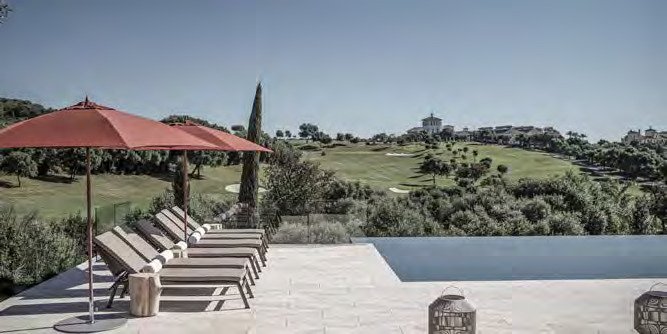 Pool terrace at Villa La Escondida overlooking the golf course